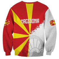 Unisex red sweatshirt with Macedonia text, flag rays, and gray map print on back