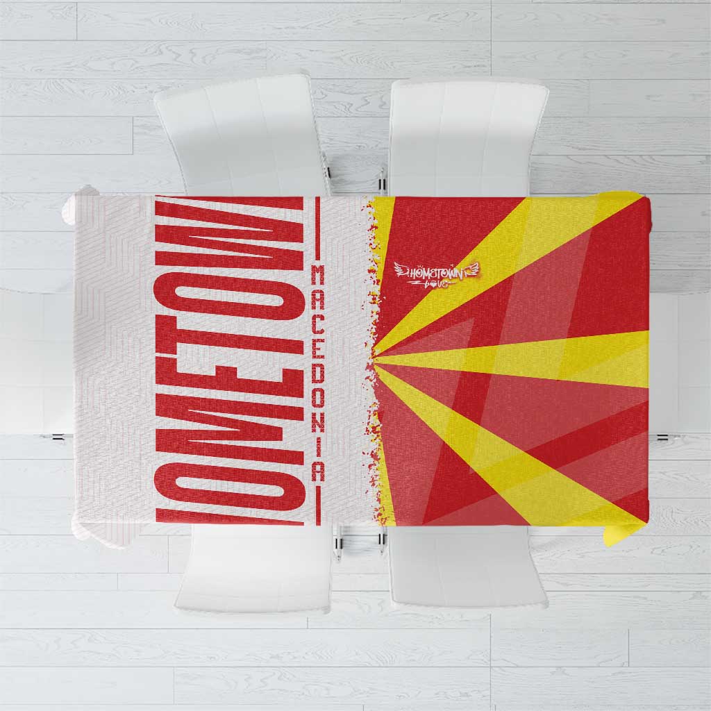 Red, yellow and white Macedonia flag and map tablecloth on folded display, corner view