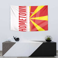 Macedonia tapestry flag featuring white section with red lettering and red-yellow sunburst rays