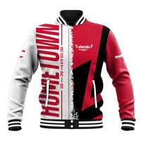 Red baseball varsity jacket with white/black panels, snap buttons, and front graphic