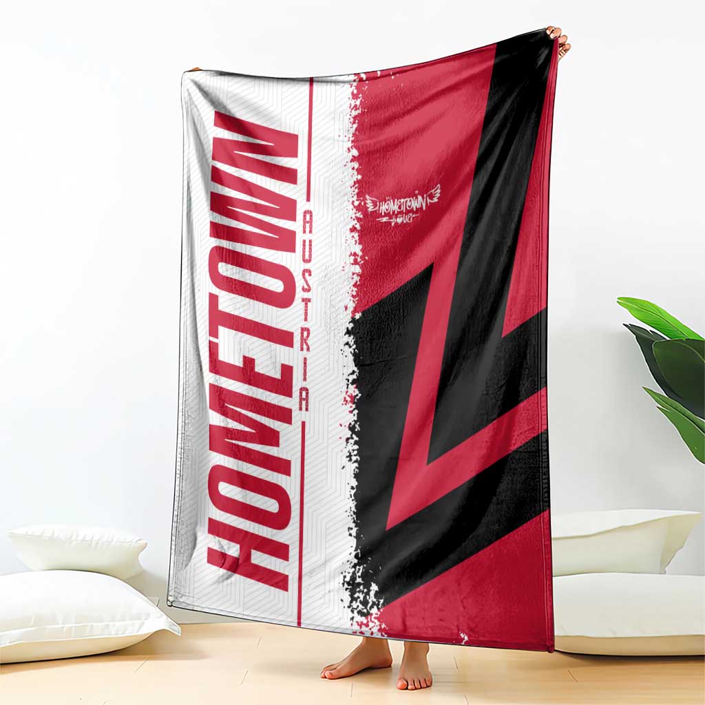 Cuba flag-themed throw blanket with red, black and white diagonal emblem, corner view