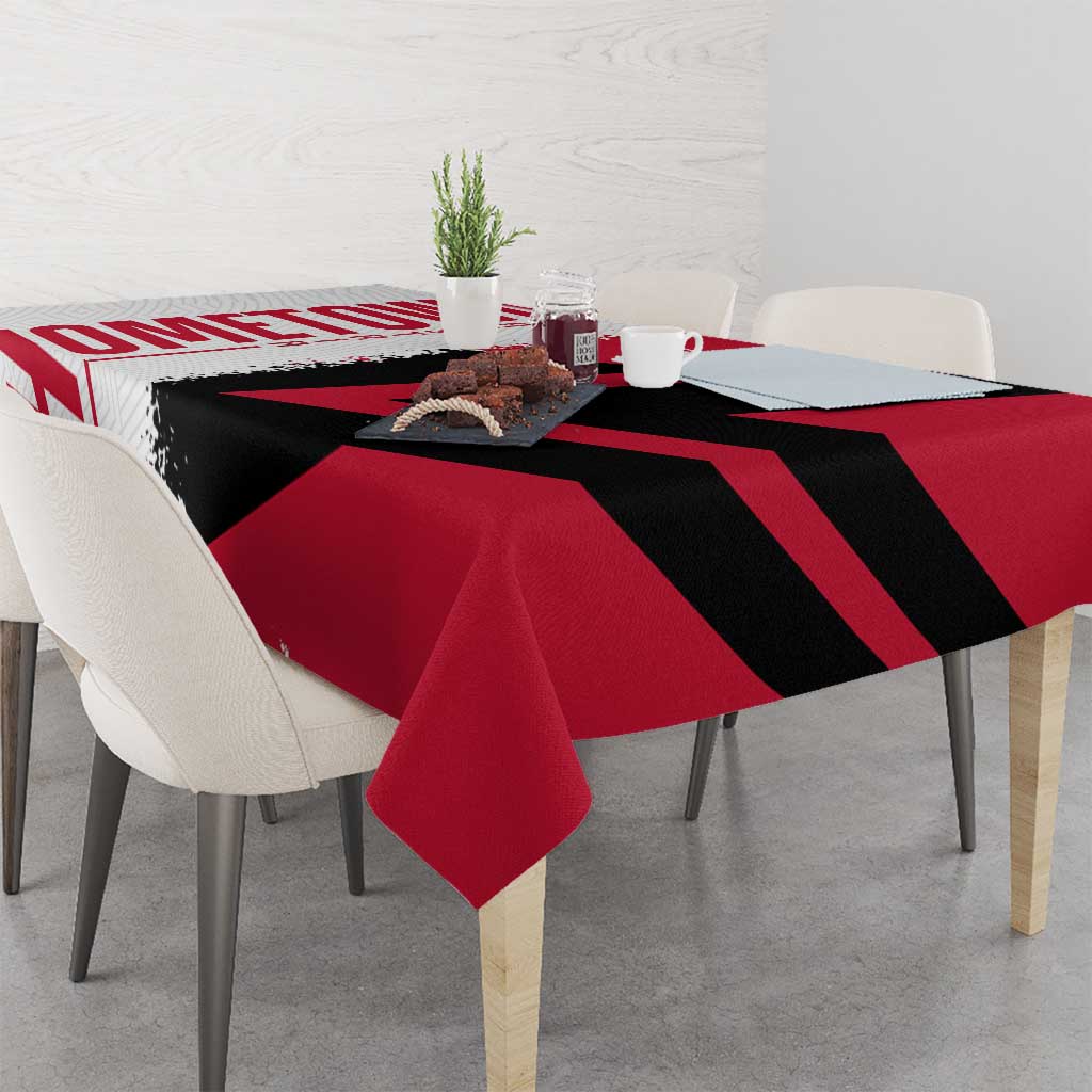 Cuba flag and map tablecloth on dining table, red and black graphic stripes, draped