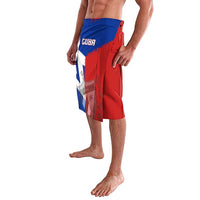 Blue and red printed shorts with partial flag graphic and elastic waistband
