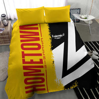 Yellow duvet cover with red "Germany" lettering, black-white chevron flag print