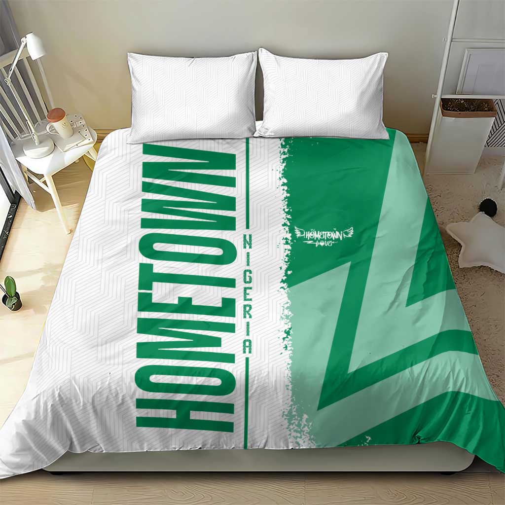 Green and white Nigeria flag bedding set with vertical “NIGERIA” lettering and map graphic