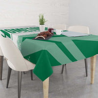 Green Nigeria flag and map tablecloth corner over table with bold diagonal design