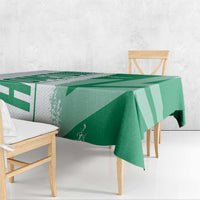 Green Nigeria flag tablecloth with diagonal stripes, neatly folded edge on bench