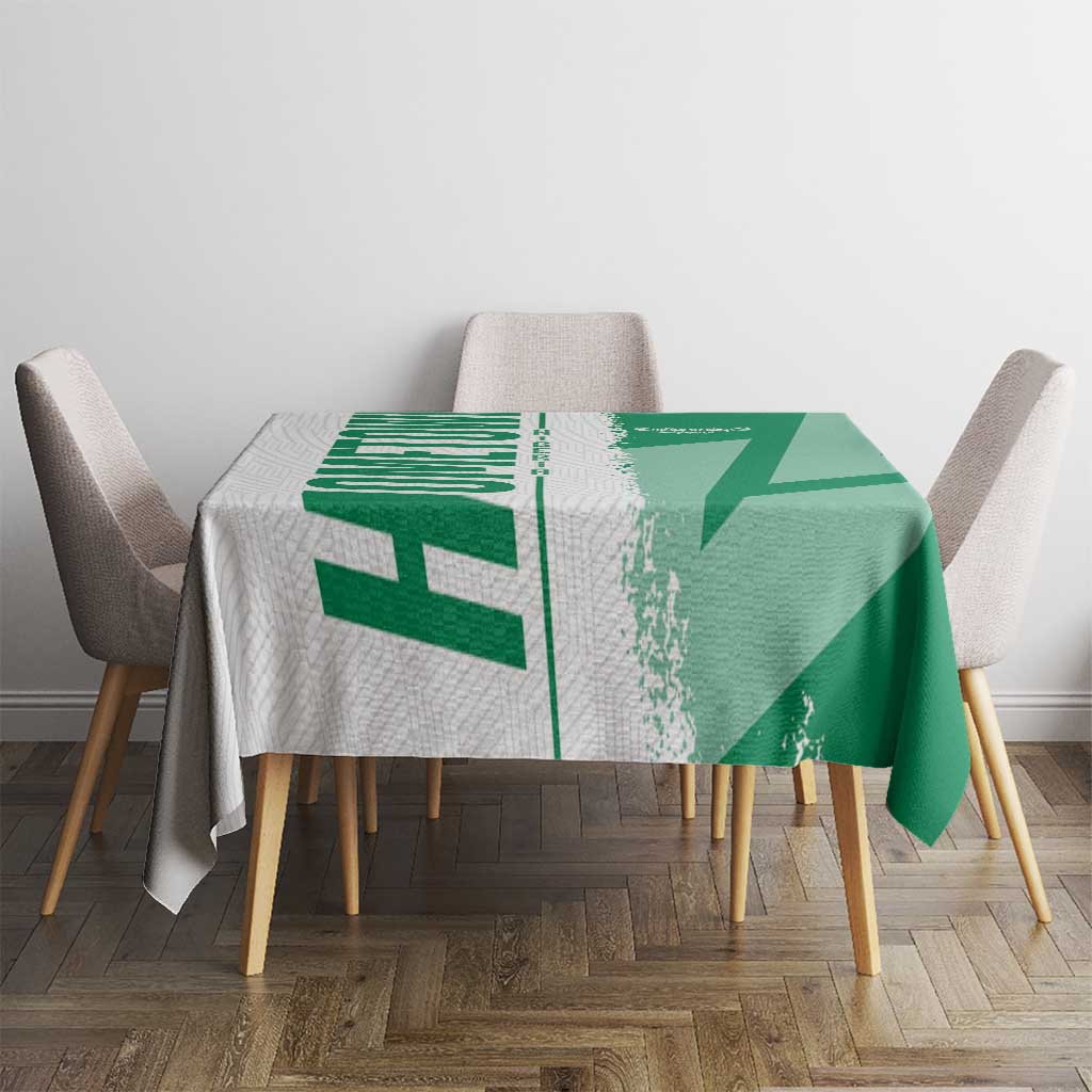 Green Nigeria flag and map tablecloth on round table with graphic center panel
