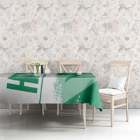 Green Nigeria flag and map tablecloth on rectangular table with diagonal stripe pattern