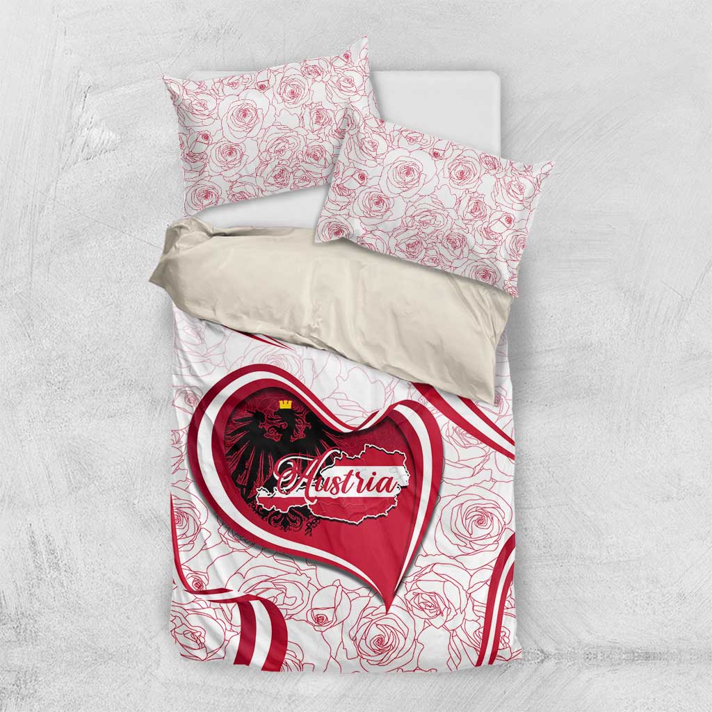White bedding set with Austria heart emblem on duvet and two rose-pattern pillowcases