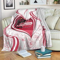 Austria-themed fleece blanket with large red heart emblem, roses, and red swirl stripes