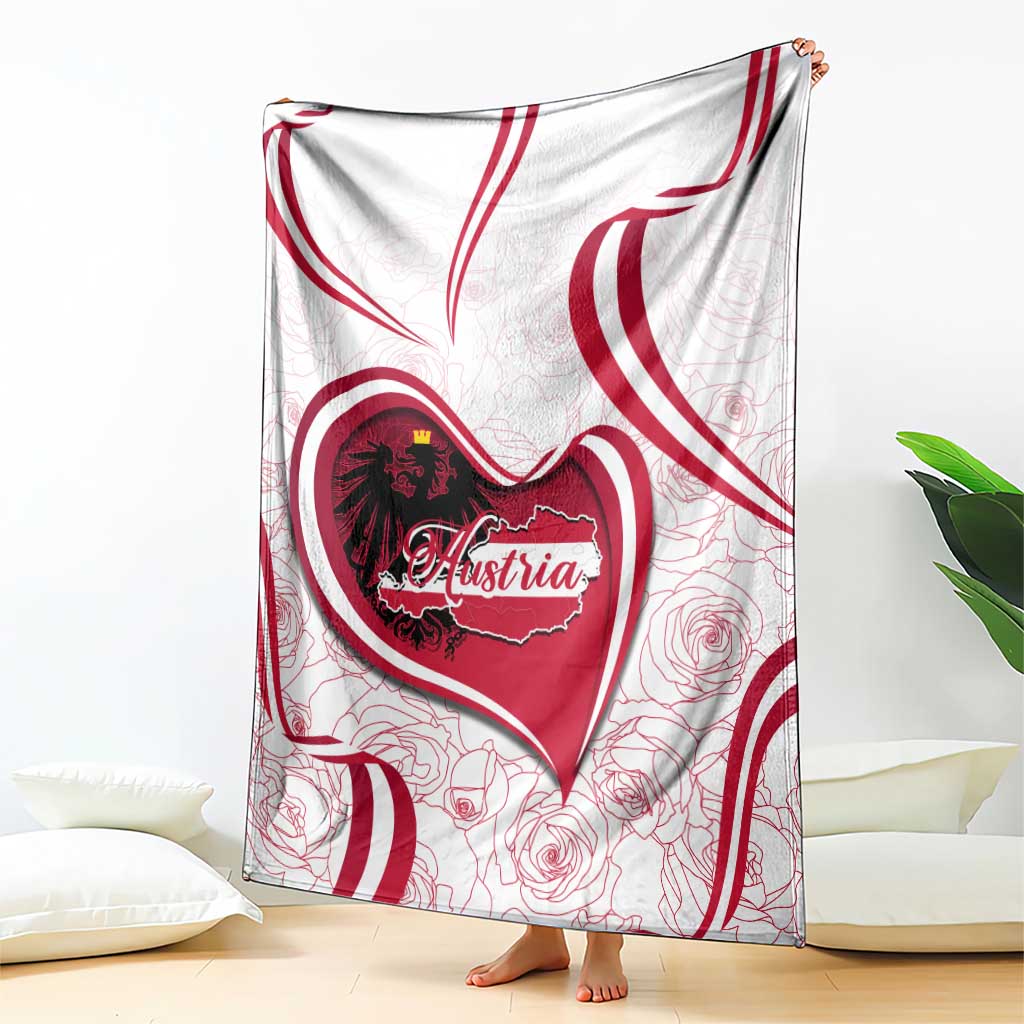 Austria-themed blanket draped, featuring a red heart crest with Austria text and rose lines