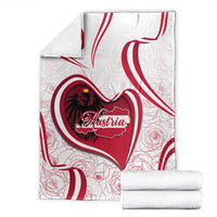 Austria-themed blanket set with folded white-red design heart emblem and rose pattern