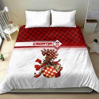 White duvet set with red check header stripe and Croatian crest, two matching pillows