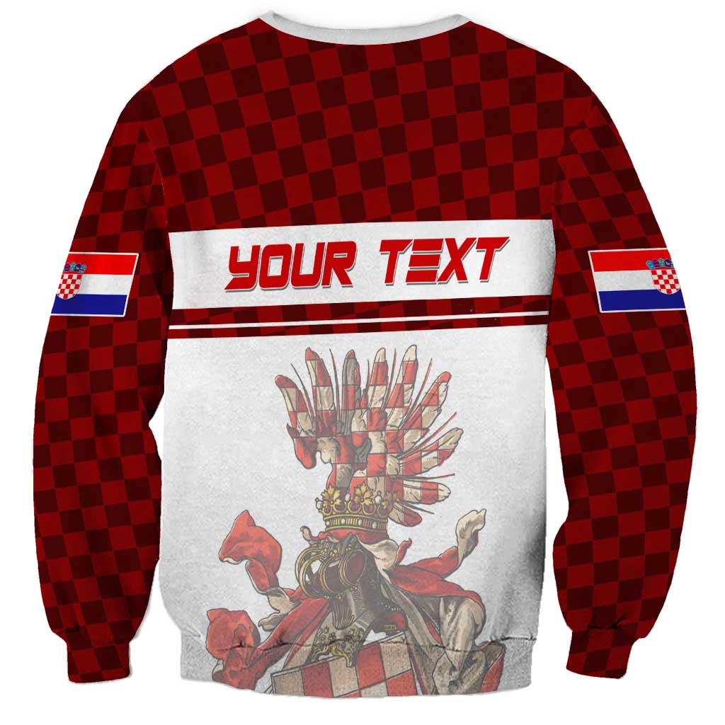 Red checkerboard sweatshirt with YOUR TEXT banner, crest emblem, and flag sleeve prints