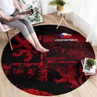 Round area rug featuring “CZECH REPUBLIC” lettering and red lion design on black