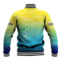 Back view yellow-teal gradient baseball jacket with fish skeleton style graphic and ribbed hem