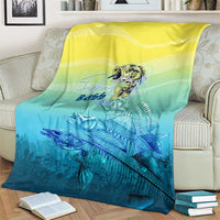 Teal and yellow bass fish artwork blanket with bold fish skeleton design