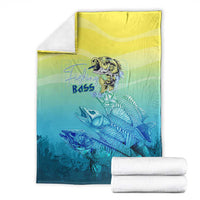 Folded teal and yellow bass fish skeleton print blanket, smooth fabric throw