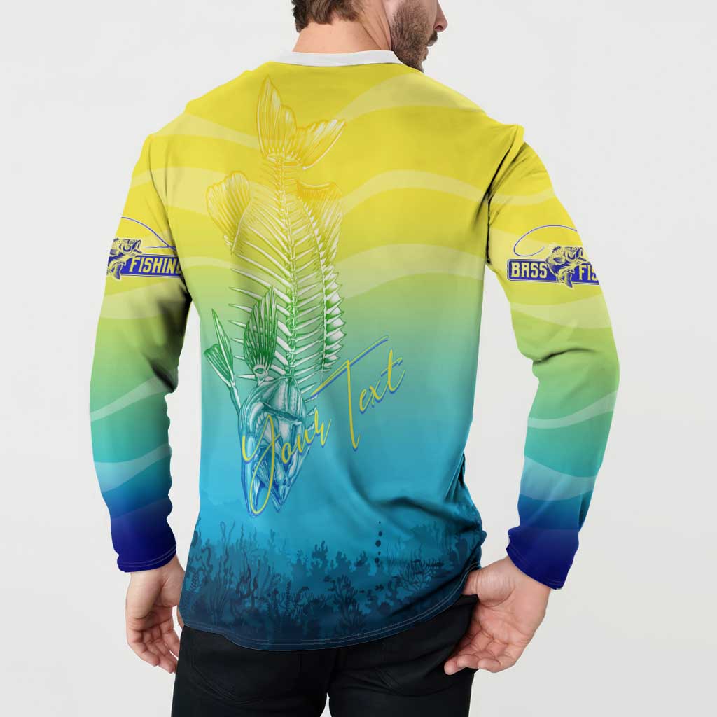 Back view yellow-to-blue button-front fishing sweatshirt with fishing rod and fish skeleton