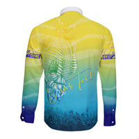 Back view yellow-to-blue long-sleeve button shirt with large fish skeleton graphic