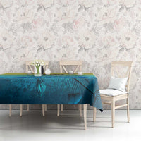 Teal-blue fish tablecloth with yellow gradient stripe and finned fish illustration