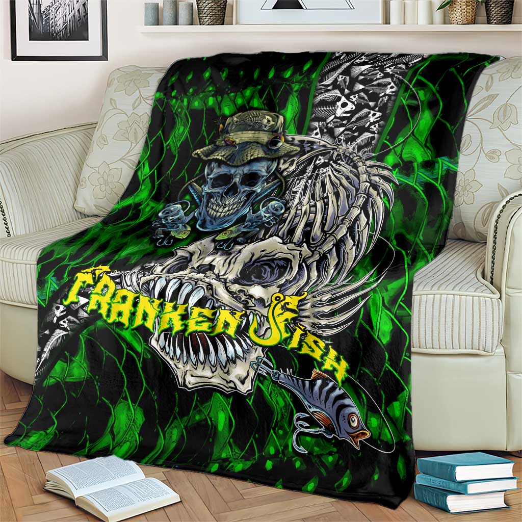Green skull fishing blanket with skeleton fish skull graphic, draped on armchair
