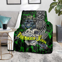 Green skull fishing blanket with skeleton fish skull artwork, on floor beside side table