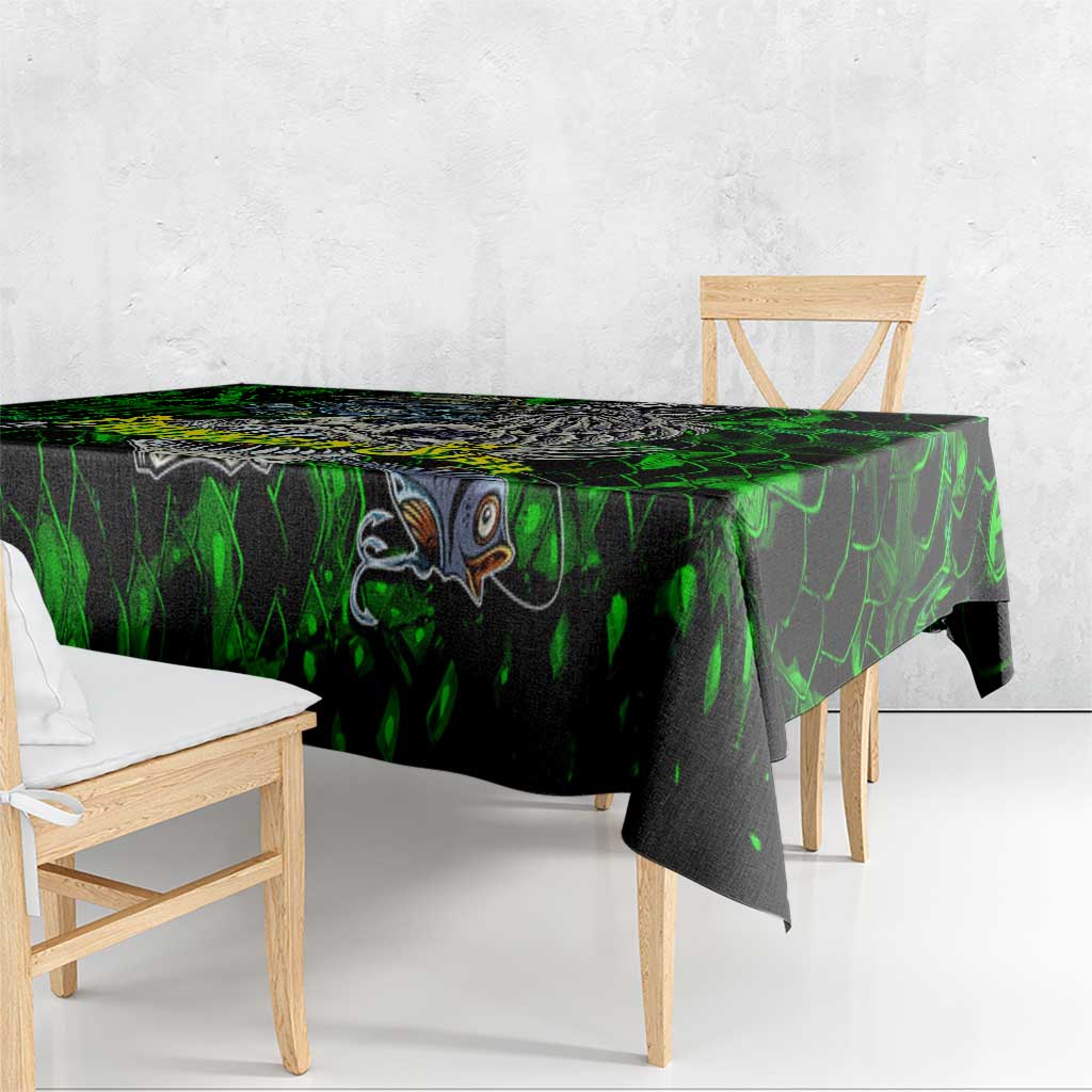 Green tablecloth with skull and fish skeleton artwork, black and neon green pattern