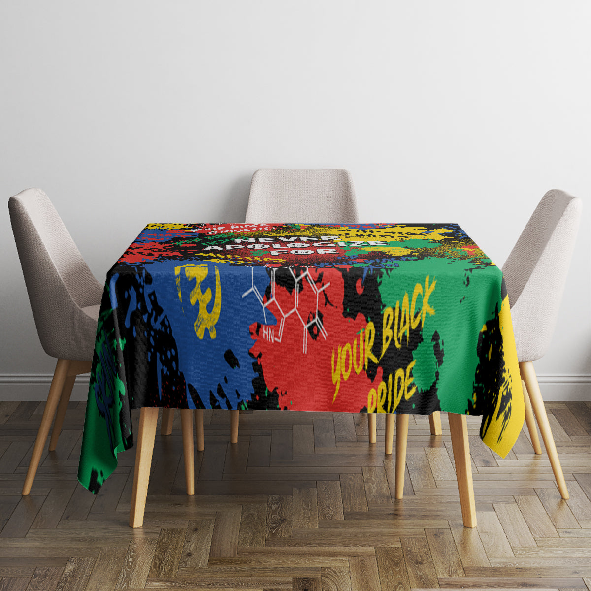 Multicolor printed tablecloth on dining table with gray upholstered chairs
