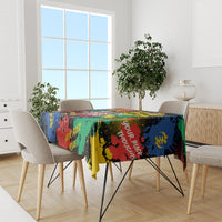 Multicolor printed tablecloth on dining table in a bright room