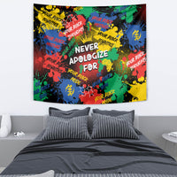 Rectangular wall tapestry featuring centered “NEVER APOLOGIZE FOR” on colorful paint splatter
