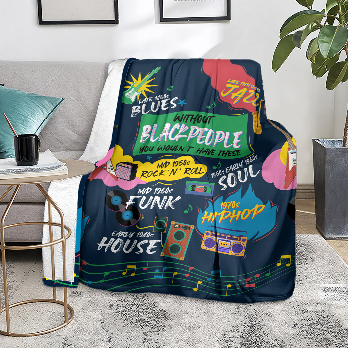 African blanket in dark blue with colorful music-themed graphic, draped on seat