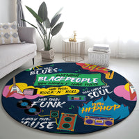 Round dark blue rug with colorful 1960s–1970s music text, guitars, and boombox art