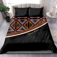 Black duvet cover and pillowcases with colorful geometric panel border and name script
