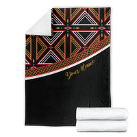 Black African blanket folded with multicolor geometric top panel and gold 'Your name' print