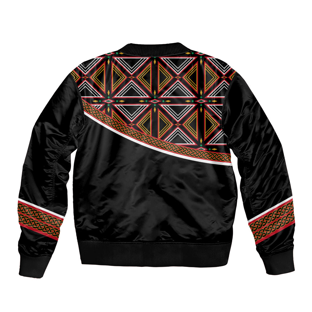 Black bomber jacket with large geometric African print on back, ribbed hem and cuffs