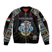 Black bomber jacket with colorful tribal sleeve panels and Seychelles map crest front