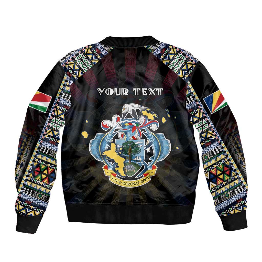 Black bomber jacket with tribal patterned sleeves and large central map graphic