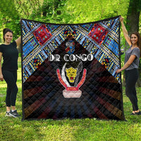 Black quilt featuring DR Congo map artwork, blue and red tribal geometric pattern