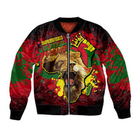 Black unisex bomber jacket with front zipper; bold lion graphic on red-green print