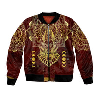 Red bomber jacket with gold Anubis emblem, ornate pattern, black ribbed trim