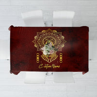 Red tablecloth with gold Anubis emblem and custom name text