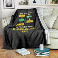Black pride blanket with “Never Apologize For” typography and Pride icons