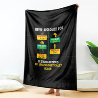 Black pride blanket draped with bold “Be unapologetically black” text and icons