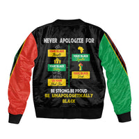 Black bomber jacket with green and red sleeves, pride slogan graphic on back