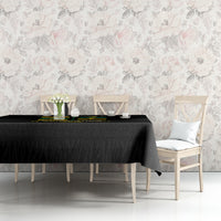 Black tablecloth with multicolor slogan strip over long table