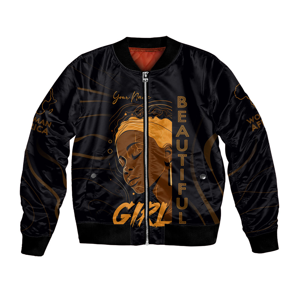 Black bomber jacket, full-zip front, gold graphic face, ribbed cuffs and hem
