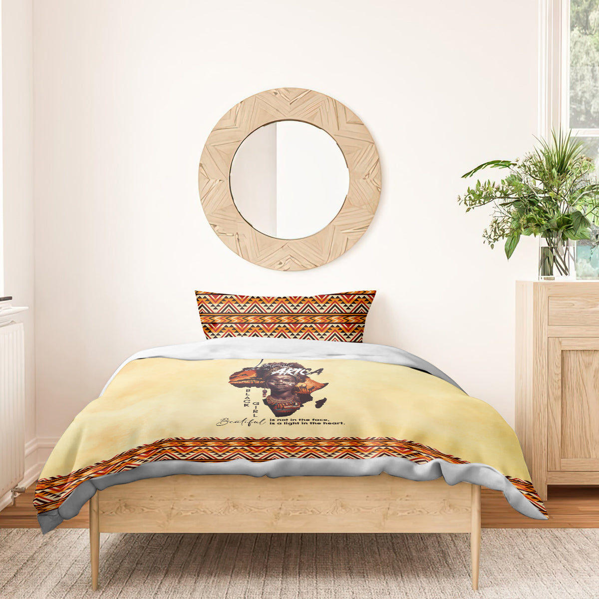 Beige bedding set with Africa portrait on duvet and orange/black patterned border, twin bed