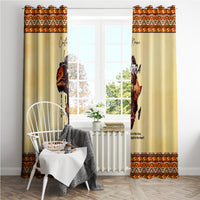 Beige window curtains with African portrait print and orange patterned border at top